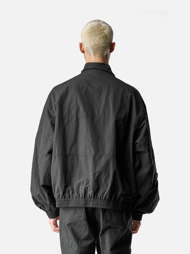 Black Oversized Parachute Jacket, back half-body on model