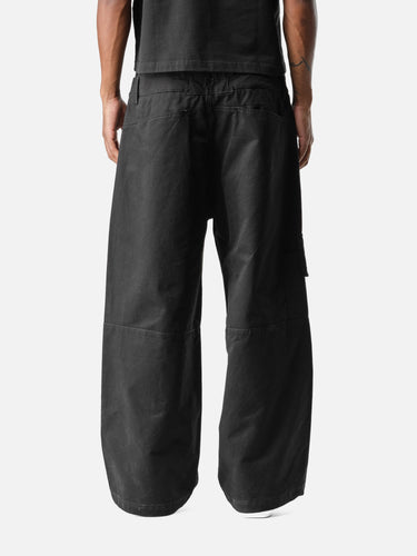 Black W4 Cargo Pants, back half-body on model