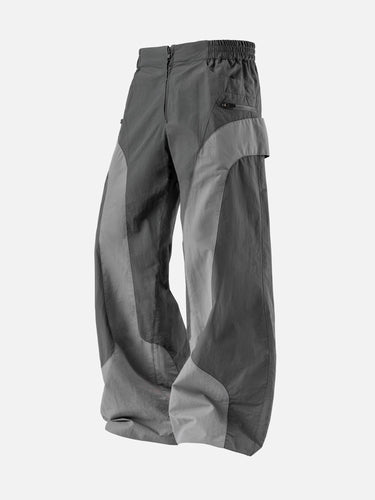 Steel W7 Trackpants, 45-degree bent-leg side view