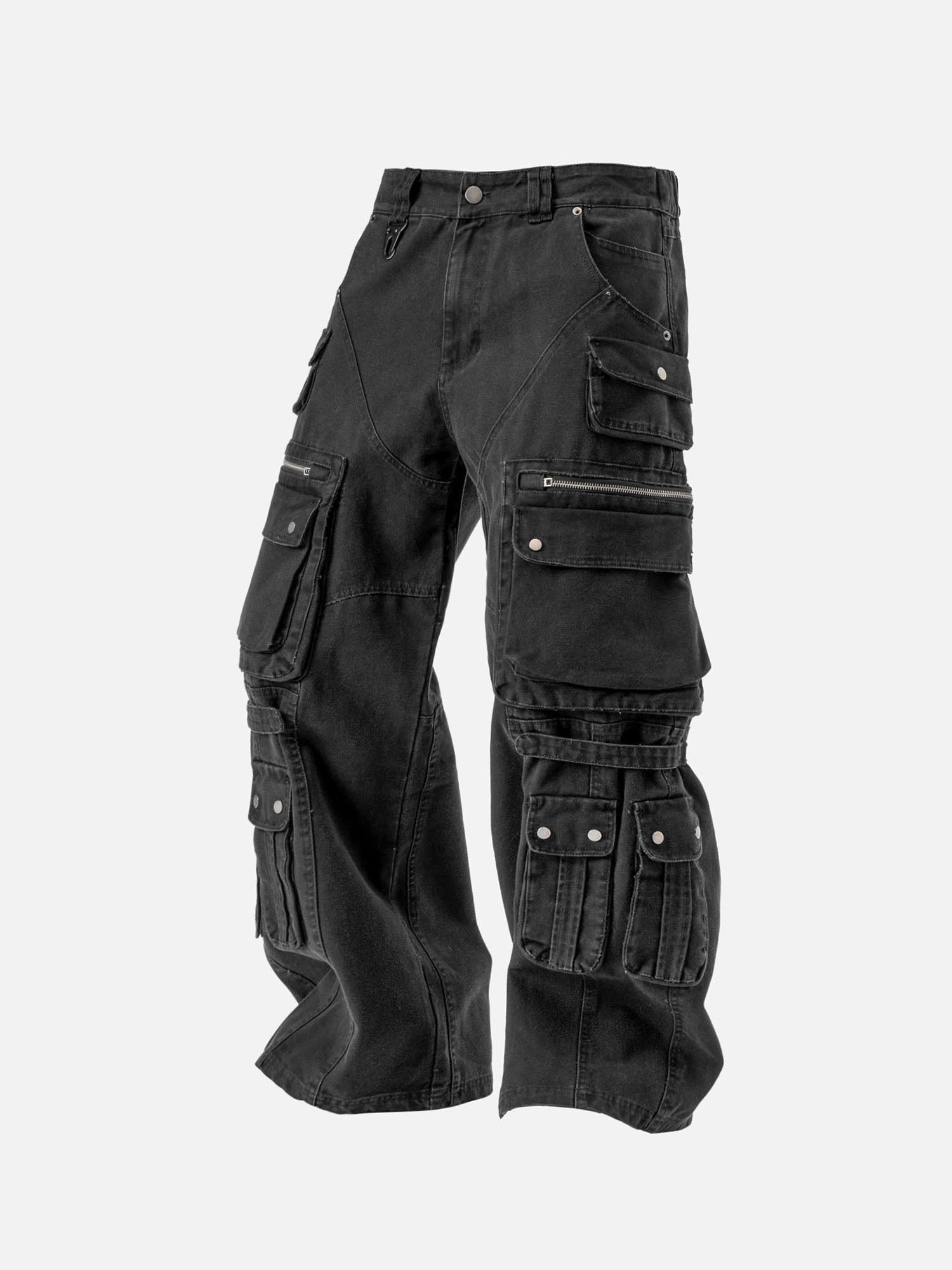 Black cargo pants featuring multiple large cargo pockets, zippers, and snap-button details, with a relaxed, streetwear style.