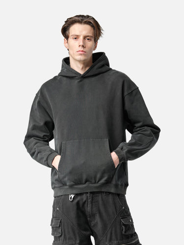 Washed Black Oversized Hoodie, casual half-body pose on model