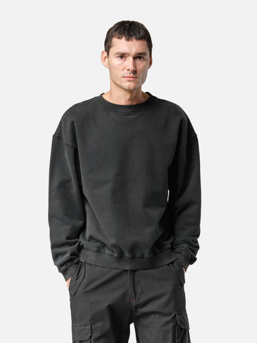 Washed Black Oversized Sweatshirt, casual half-body pose on model