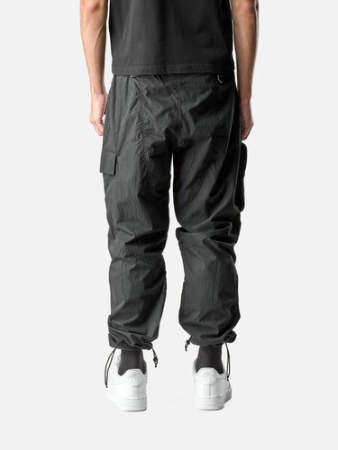 Black T27 Cargo Pants, back half-body on model
