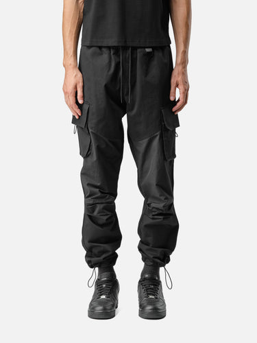 Black T32 Cargo Pants, front half-body on model