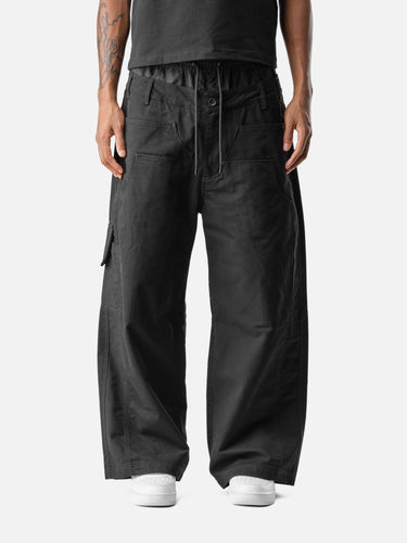 Black W4 Cargo Pants, front half-body on model